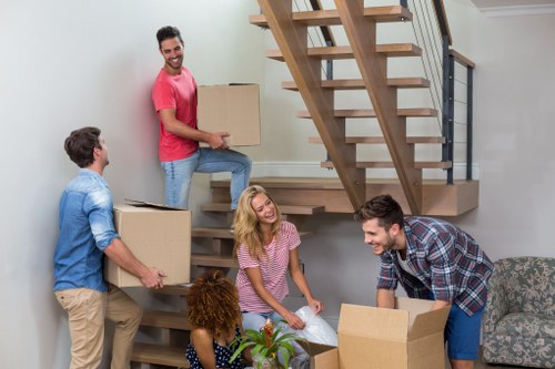 Packed boxes and furniture ready for a Harrow property move