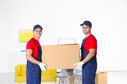 Local movers loading household items for a move in Harrow
