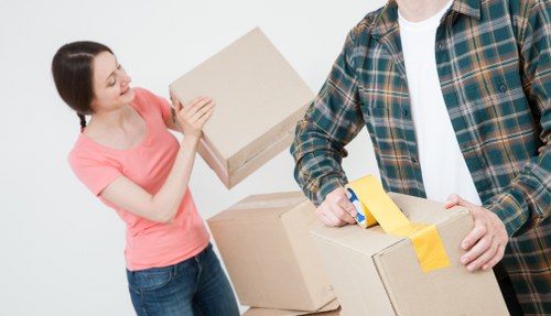 Packed boxes and furniture ready for house removals