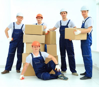 Local moving team loading furniture in Harrow