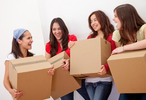 Local removal crew handling desks and equipment in Harrow