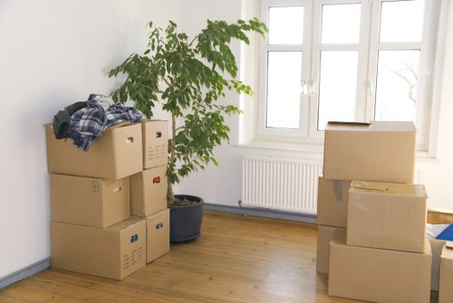 Family preparing for a home move with boxes in a Harrow property
