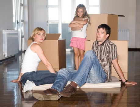 Packed boxes and furniture ready for removal in Harrow